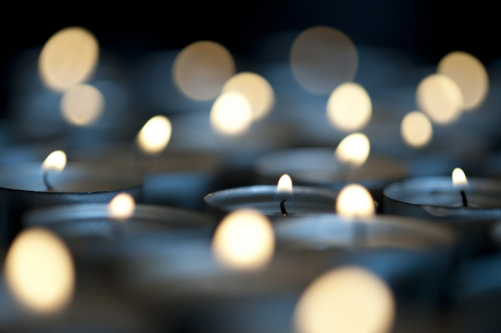 burning christmas candles pictured with a narrow depth of field